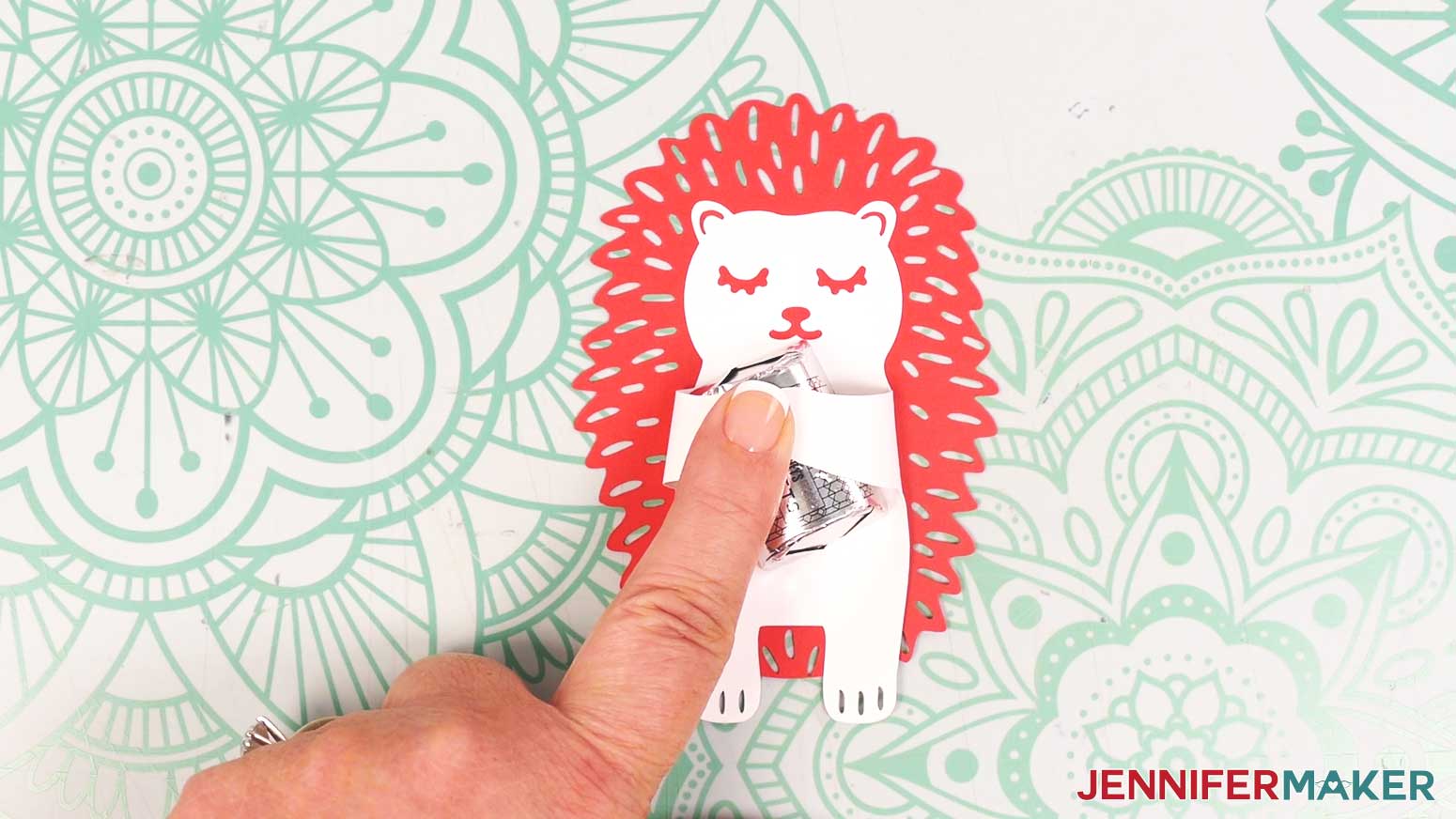 Attach other arm to the glue dot use a little pressure to make sure the glue sticks.