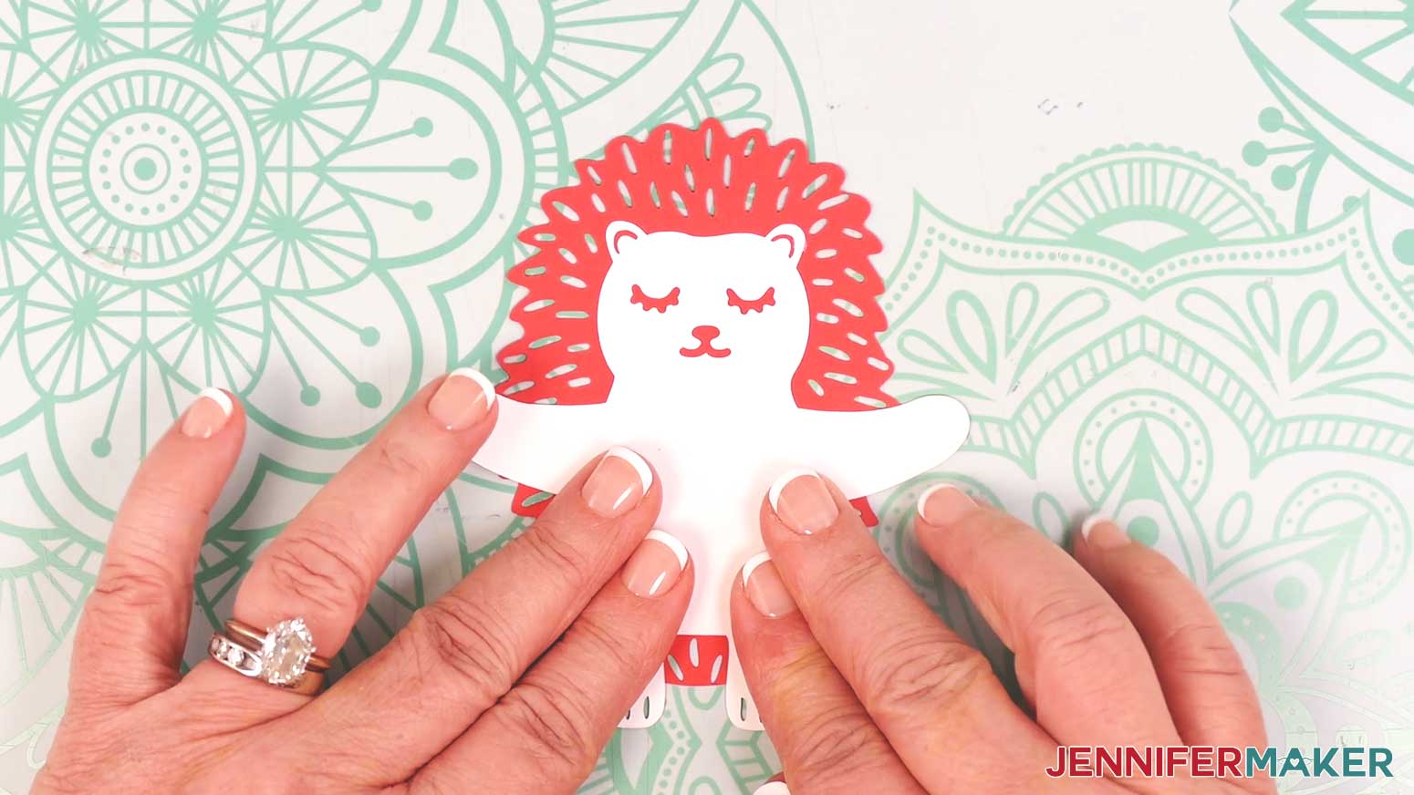 Adhering the hedgehog body to second piece of cardstock.