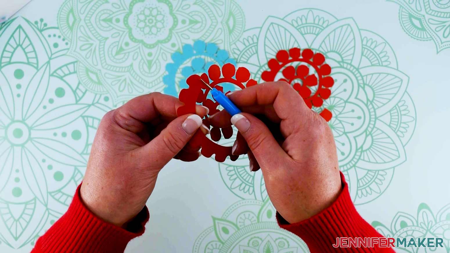 Start at the outer edge to roll paper flower with a quilling tool for the Valentine Mailbox Craft.
