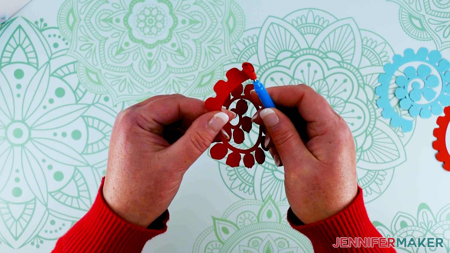 Use a quilling tool to roll the paper flower for Valentine Mailbox Craft