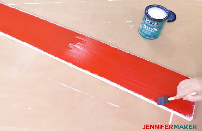 Putting a thin coat of Polycrylic on a painted board for a vertical welcome sign