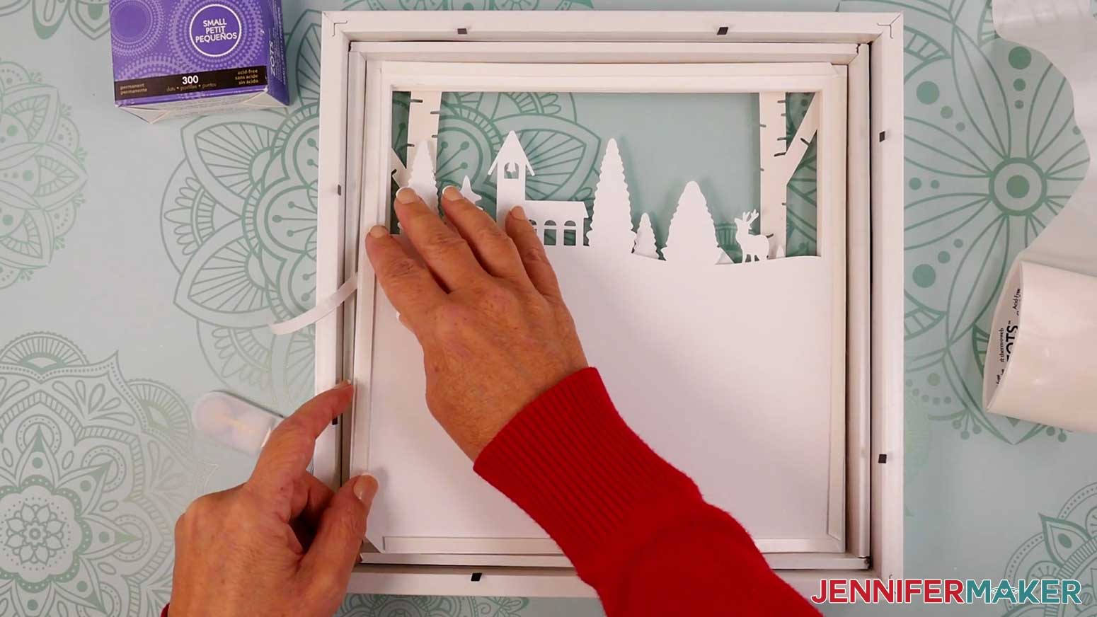 Press Layer 5 onto the back of Layer 4 of the Village Shadow Box With Lights.