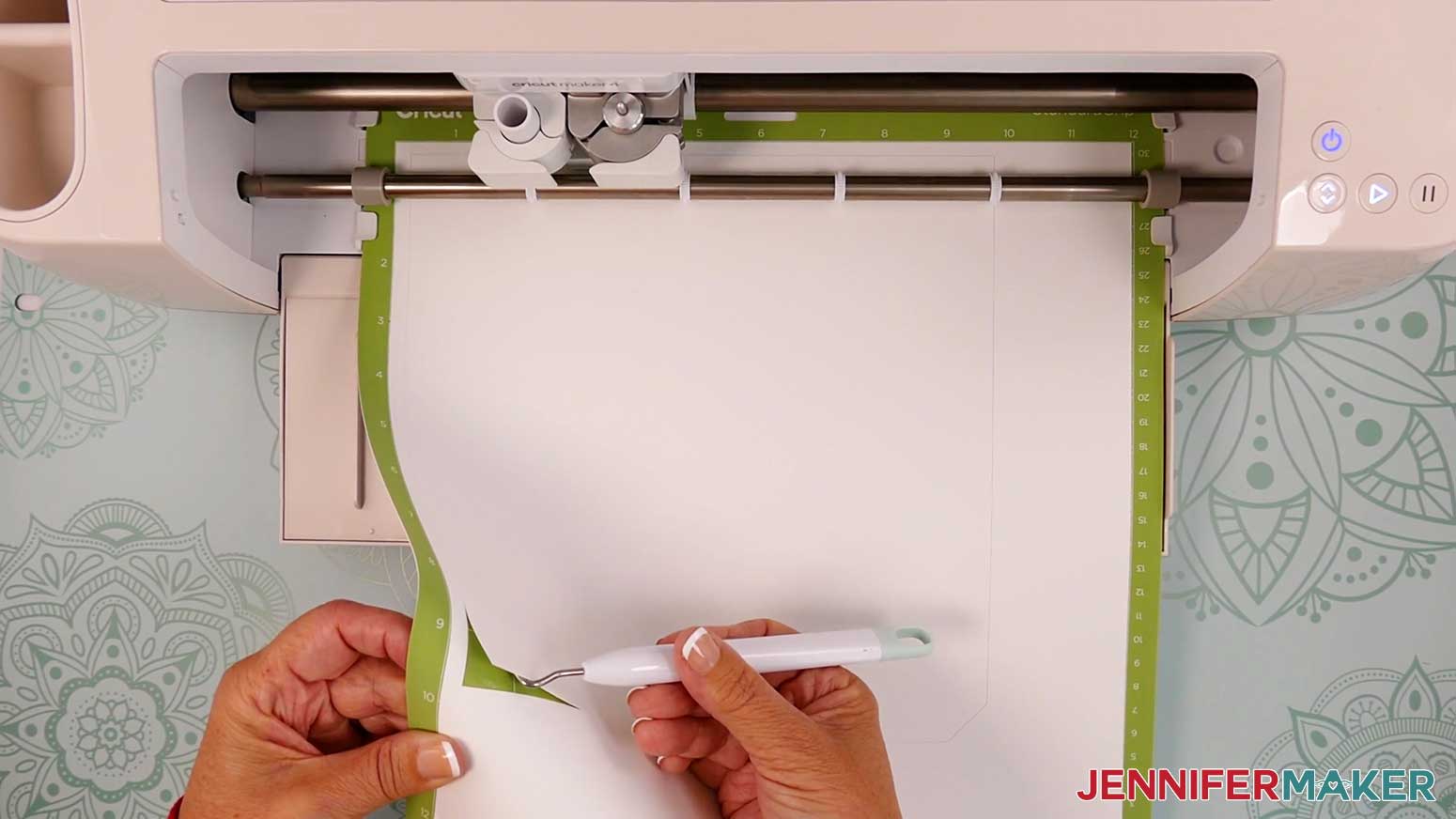 Check the cut of the Village Shadow Box With Lights layers before removing them from the Cricut.