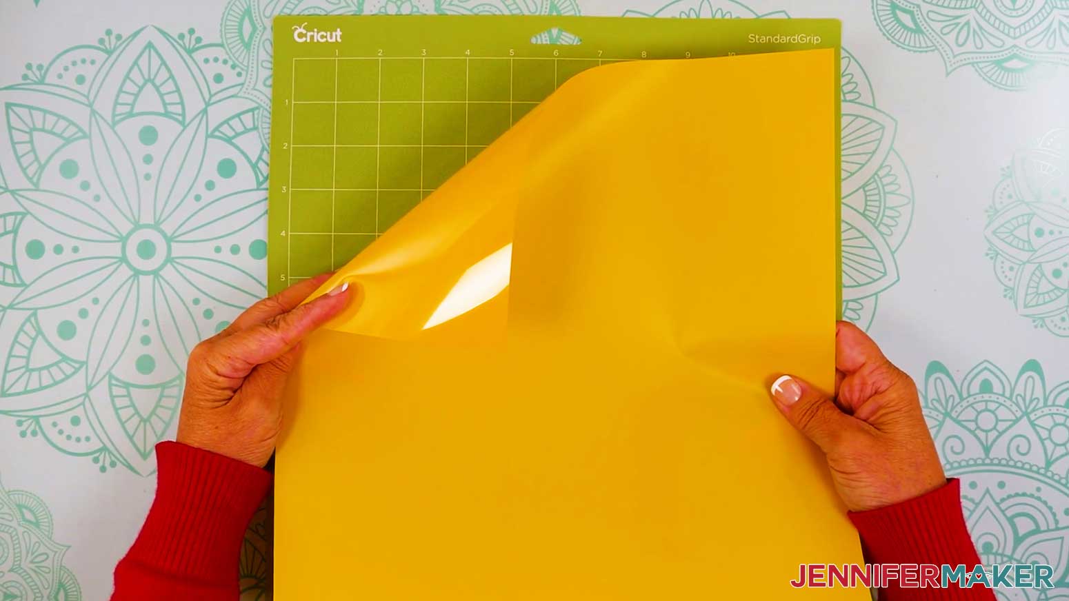 Place the iron on vinyl shiny carrier side down onto the machine mat to cut the vinyl vs iron on design.