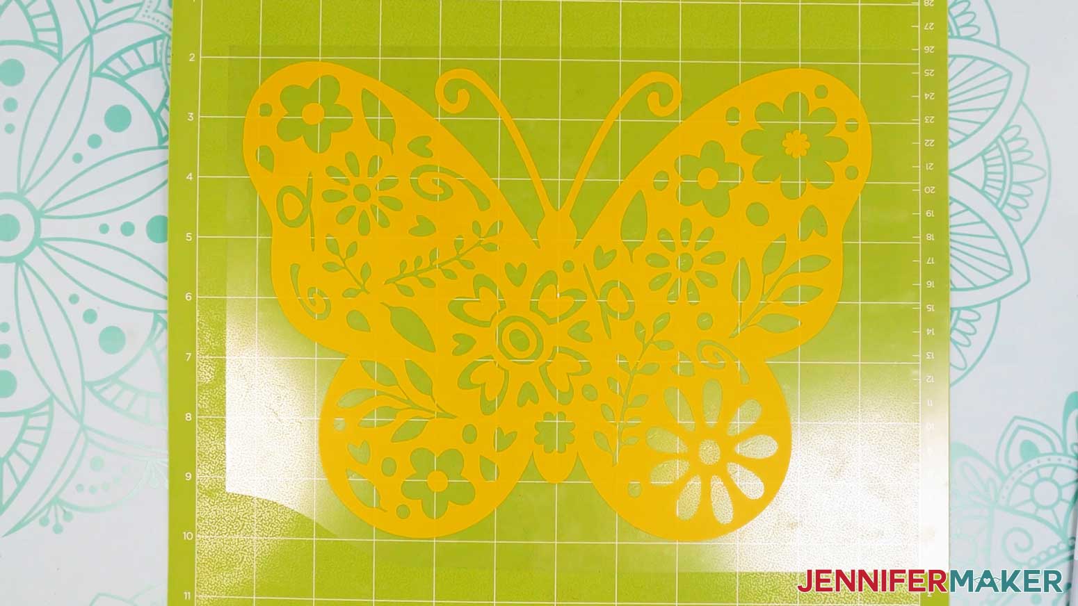 The vinyl butterfly vinyl vs iron on design is weeded and ready to apply.