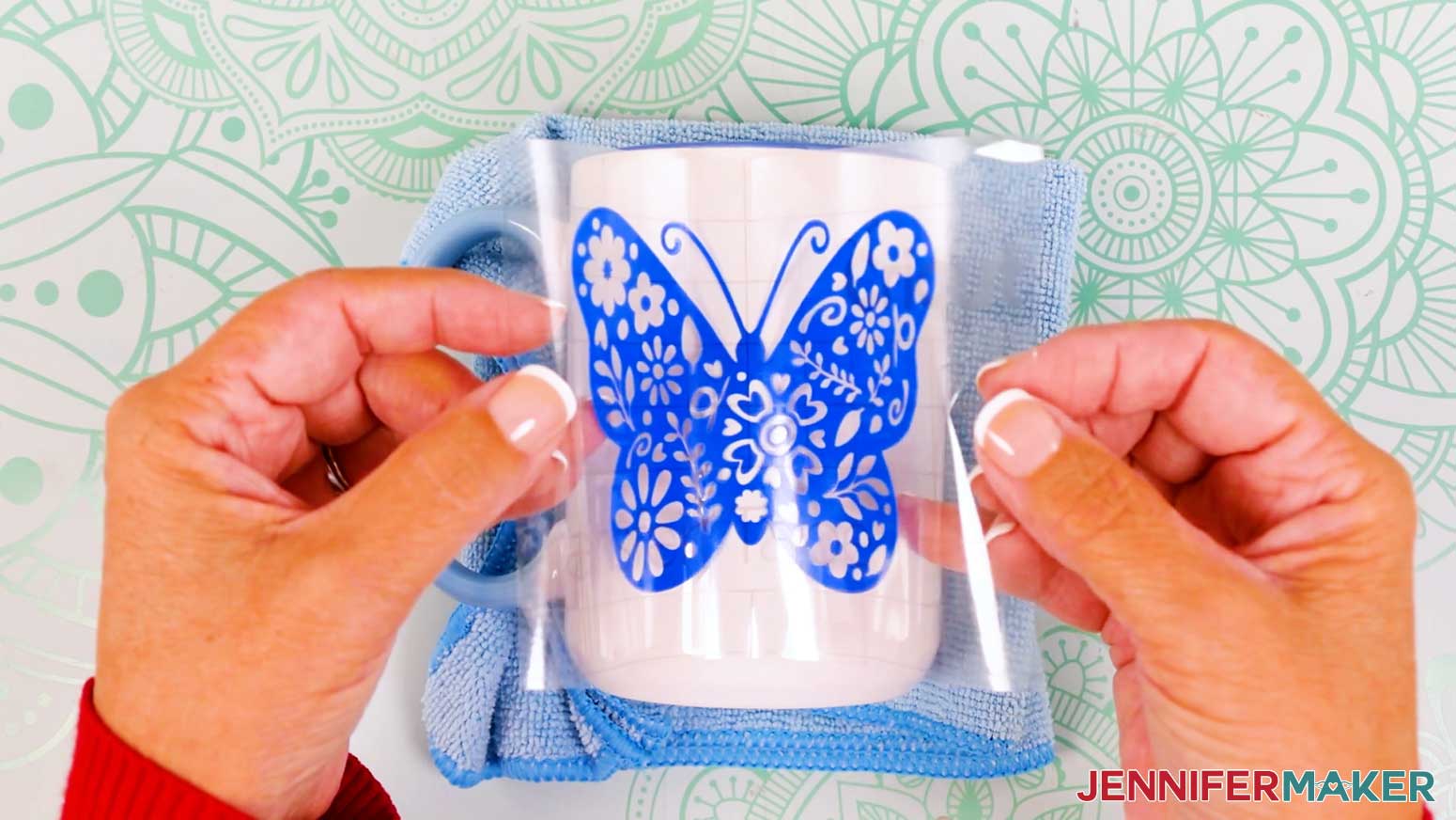 Place the vinyl vs iron on design onto the side of the mug.