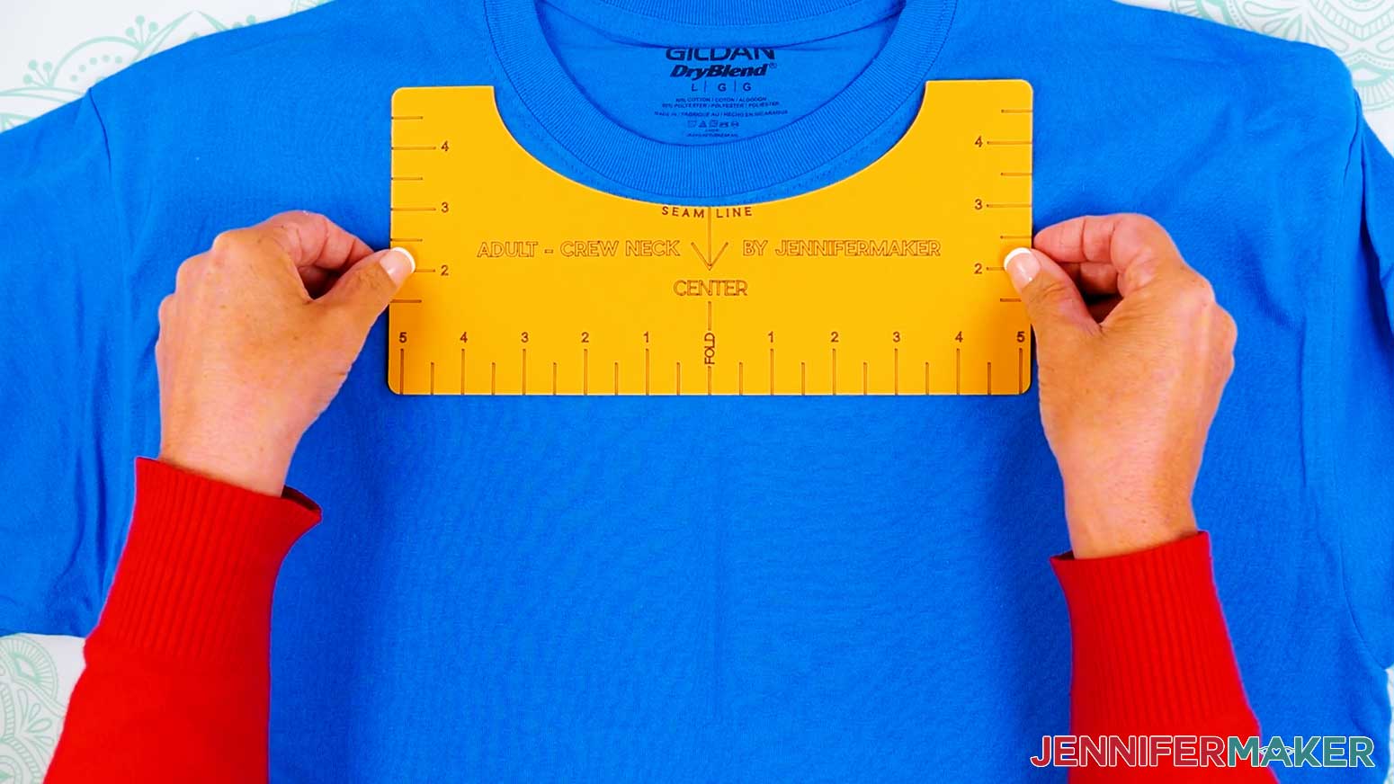 Use a t-shirt placement guide to prepare the placement of the vinyl vs iron on design onto the shirt.