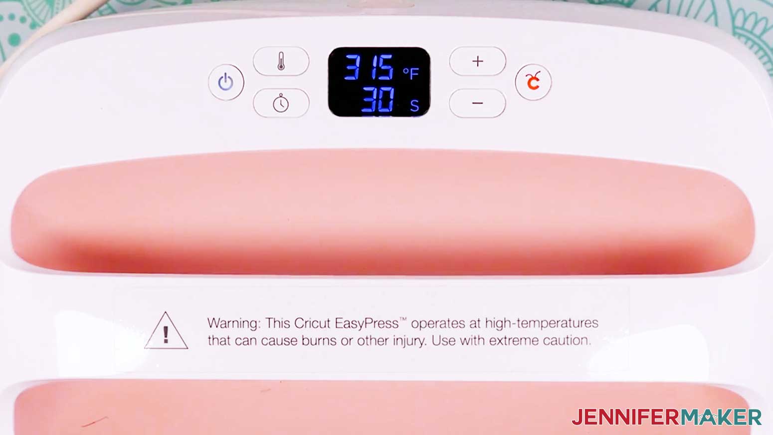 Set the correct heat setting and time for the vinyl and material being pressed for the vinyl vs iron on design.