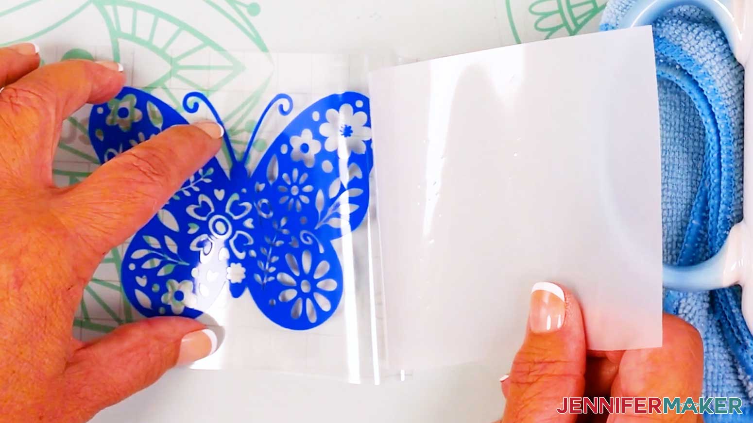 Peel the carrier sheet from the transfer tape to apply the vinyl vs iron on design.
