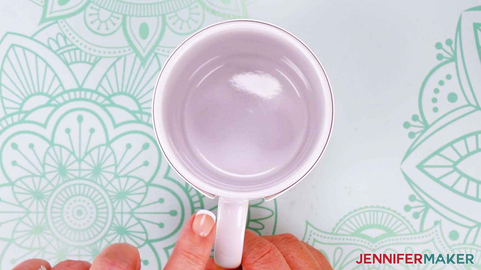 Check if the thicker paper is allowing the edges near the handle to lift away from the mug. NOTE: The thick paper might lift a little on the shaped ends, and any gaps can let the ink escape when the heat turns it into a gas.