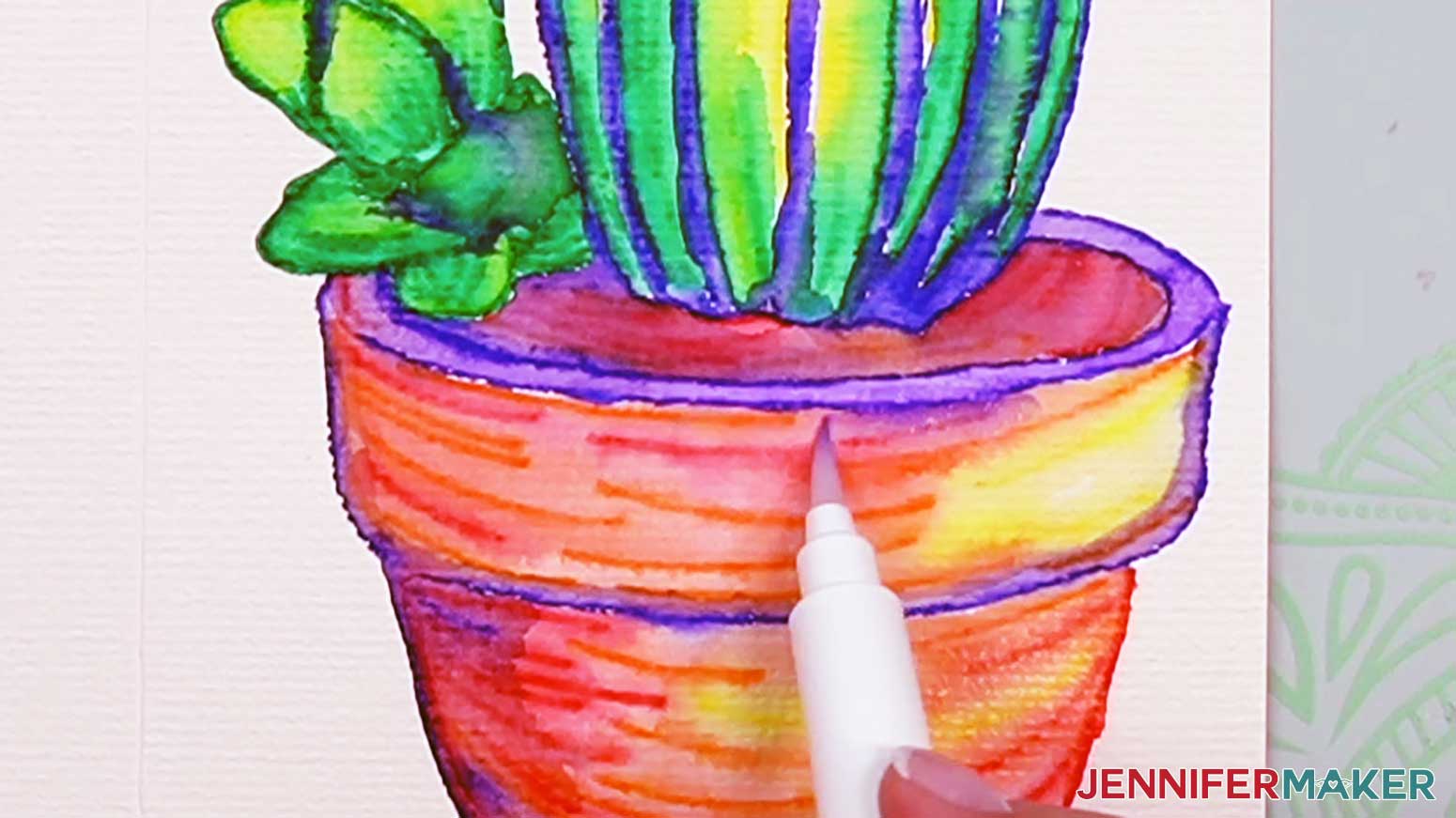 Blend the top edge of the blue lines of the pot toward the bottom edges to create a shadow on the watercolor cactus pot.