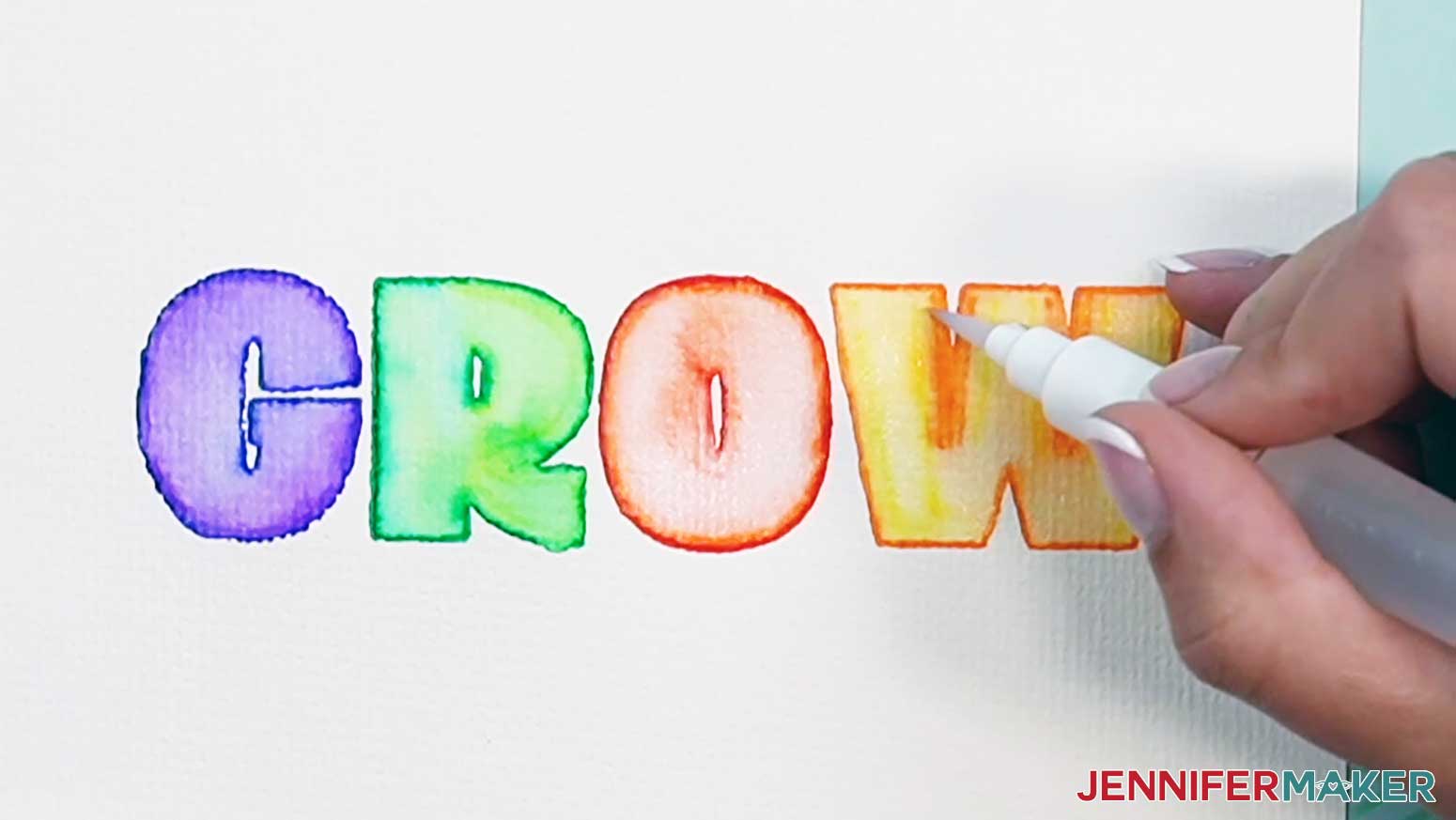 Continue to blend all the colors in the watercolor word GROW to fill in the letters.
