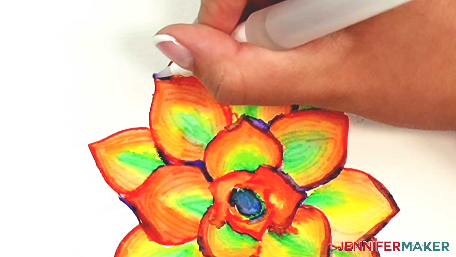 Color the blue lines around the petals of the watercolor succulent to shade the petals.