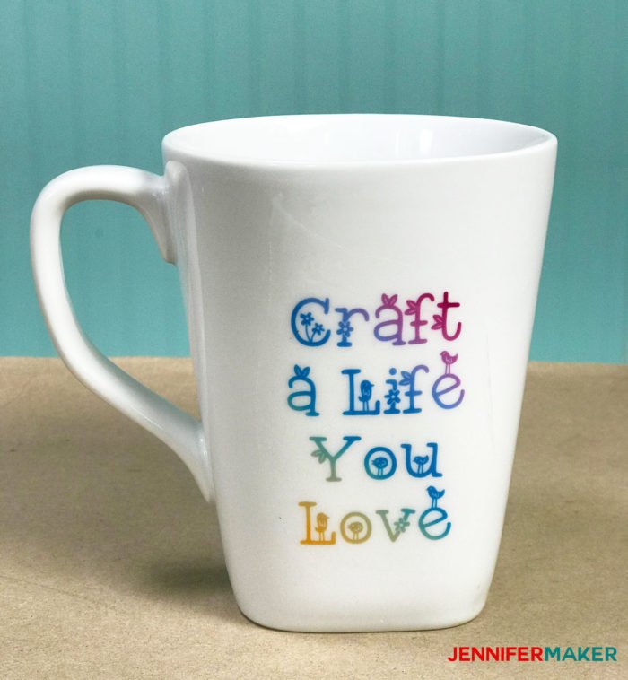 Waterslide decal mug in white with the words "Craft a Life You Love" on it