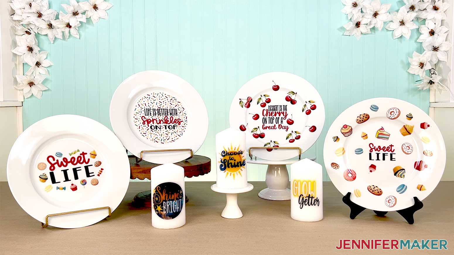All the projects in the waterslide decal tutorial have been completed and are displayed on a table.