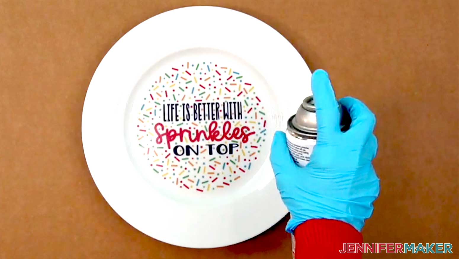The cooked plate is being sealed with the clear spray coating to ensure that it will remove easily.