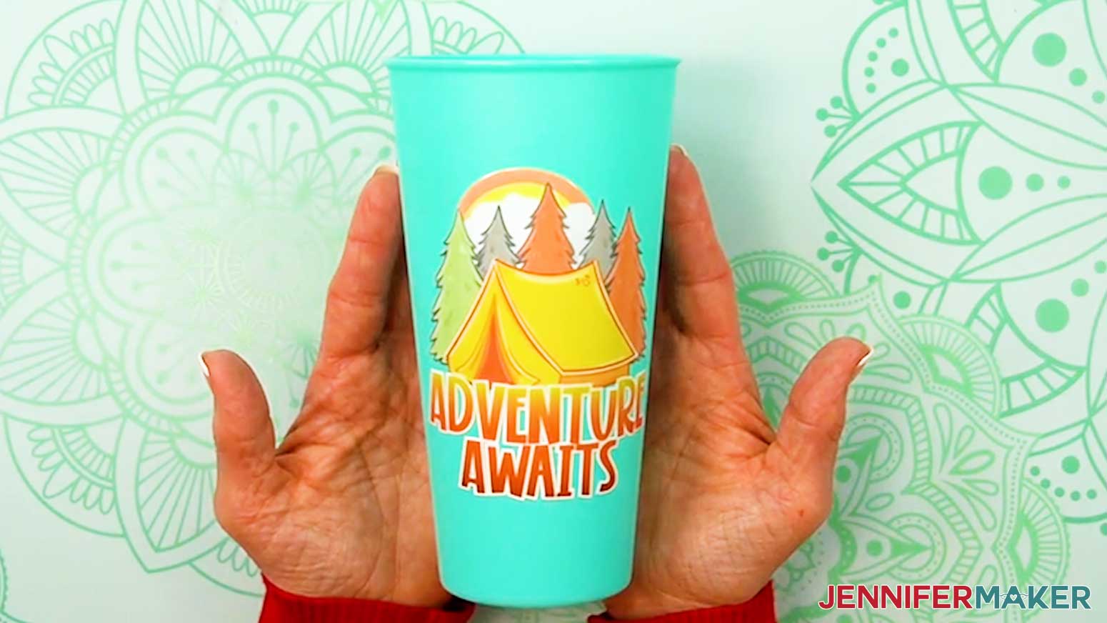 The UV DTF design is applied to the cup.