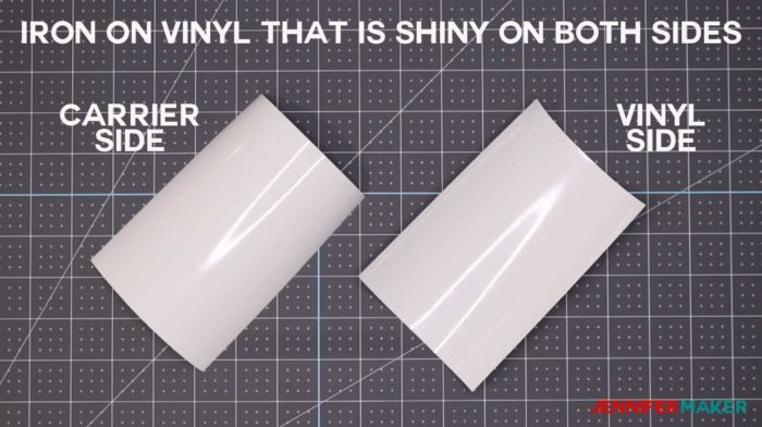 Two pieces of white iron-on vinyl that are shiny on both sides - which is the side you cut on?