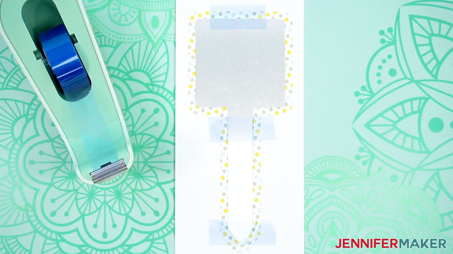 Tape the sublimation garden stake facedown to the print using heat resistant tape.