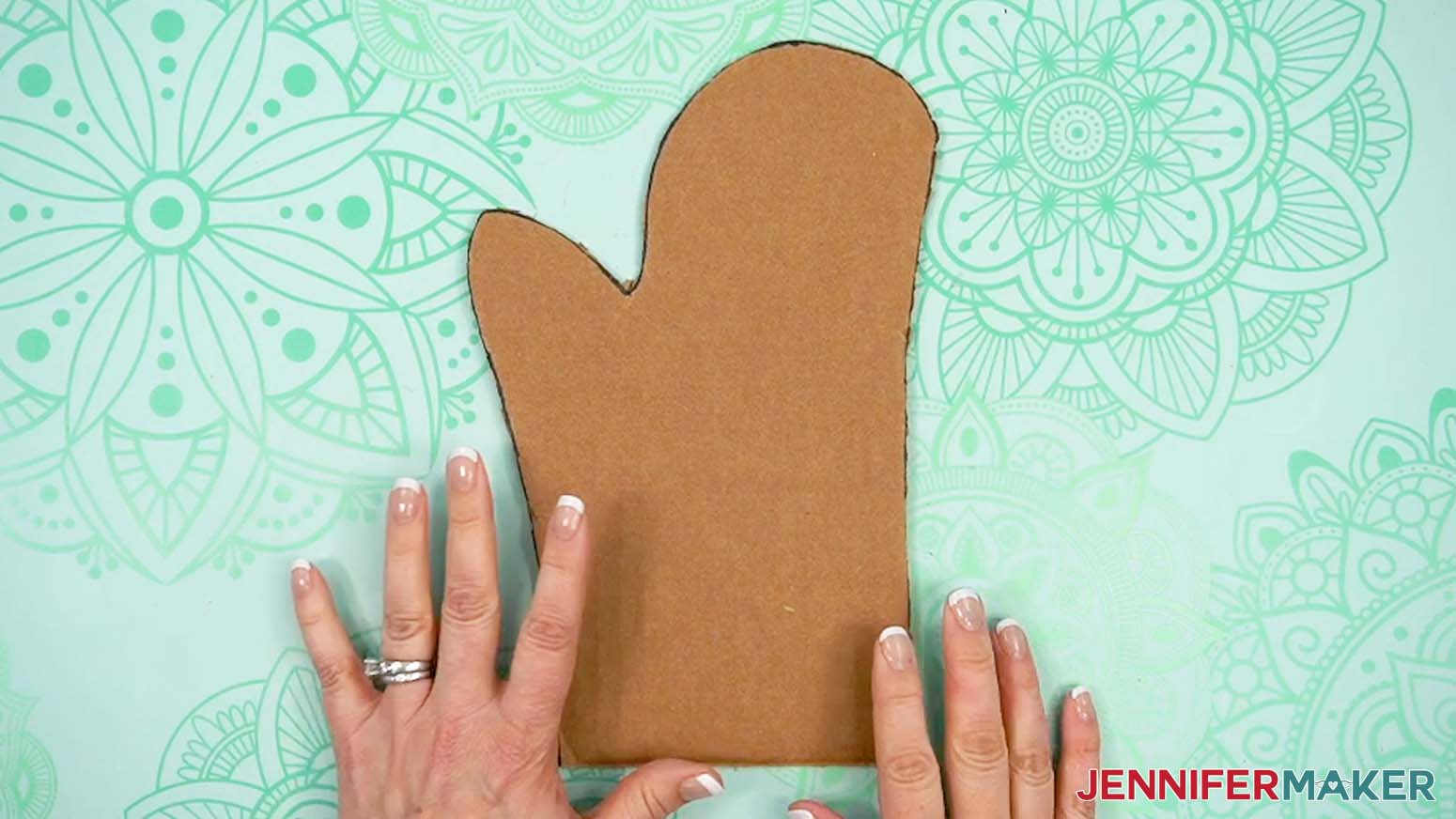 Trim the cardboard insert to fit the inside of the sublimation oven mitt.