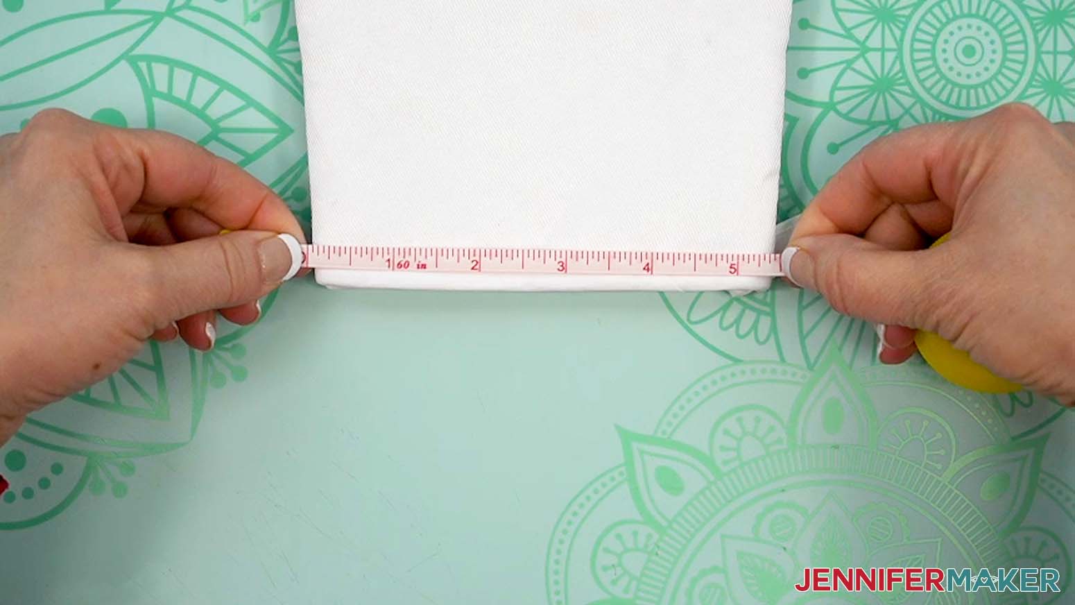 Measure the dimensions of the oven mitt to verify the design will cover the surface.
