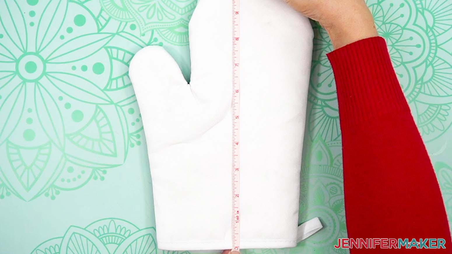 Measure the dimensions of the oven mitt to verify the design will cover the surface.