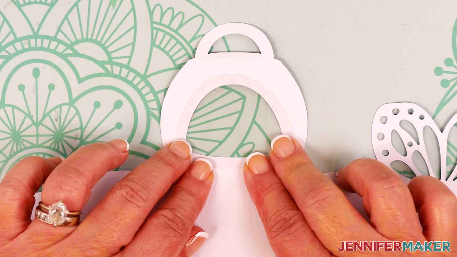 Press the acetate to the glue for the treat box window.