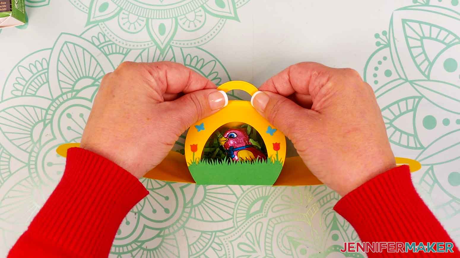 Bring the front and back panels together and pinch the handle pieces together.
