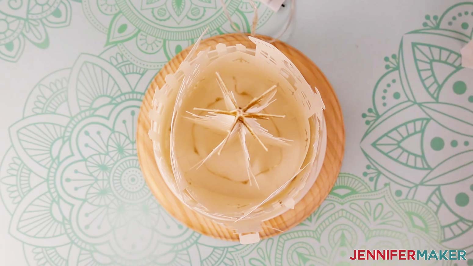 Place the bottom of the assembled lantern onto a wooden base.