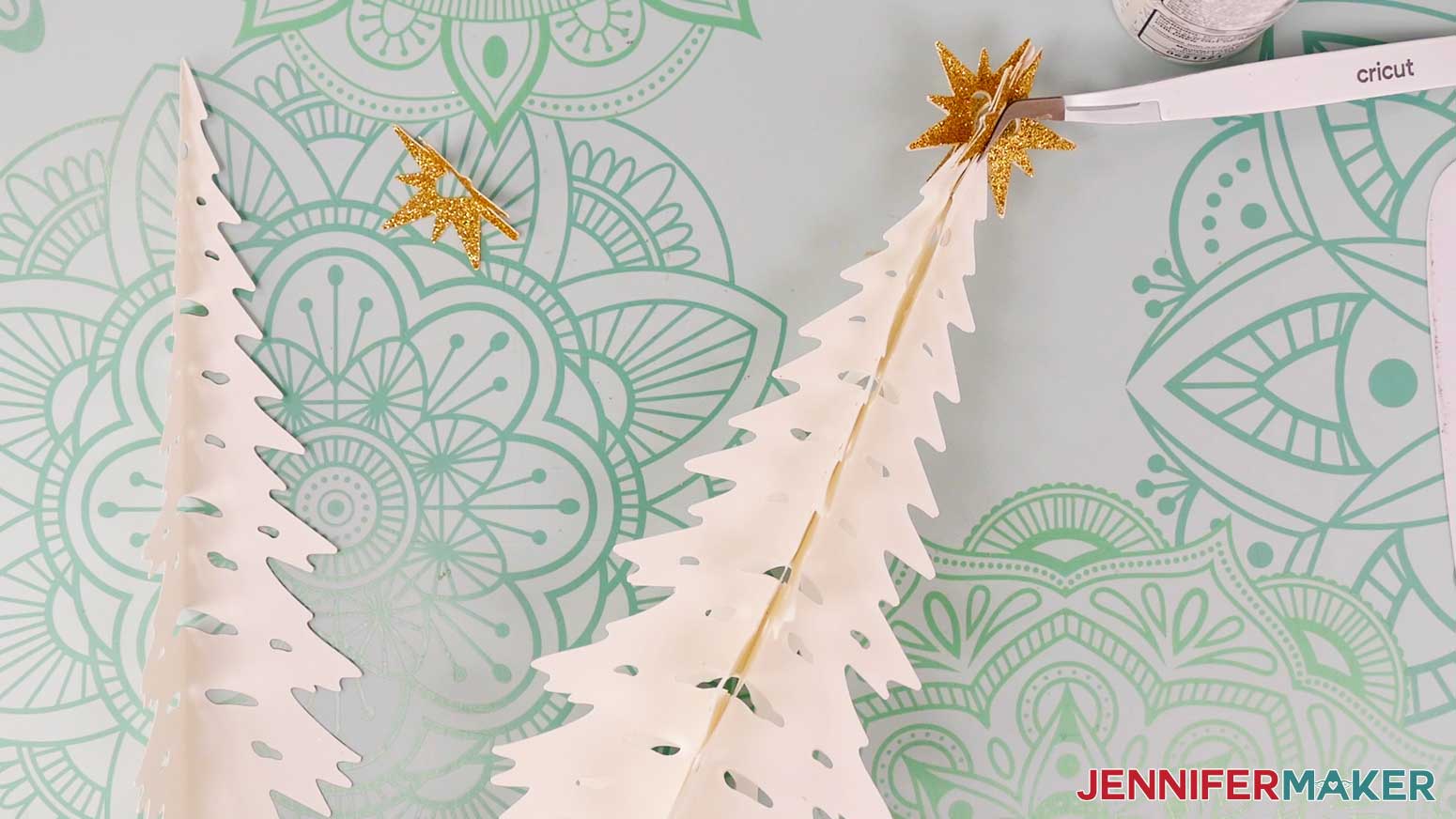 Continue attaching star and tree pieces in the same order