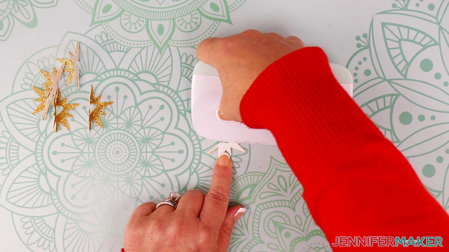Fold inward along the dashed lines to make a valley fold down the center of all 12 pieces. Use a scraper.