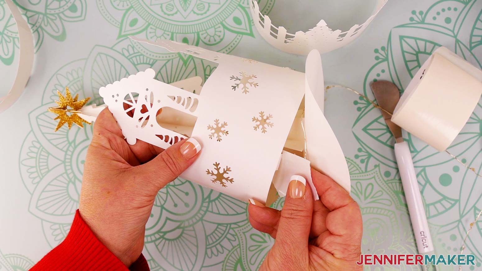 add glue to the next tab by carefully lifting the layer away from the base in that area.