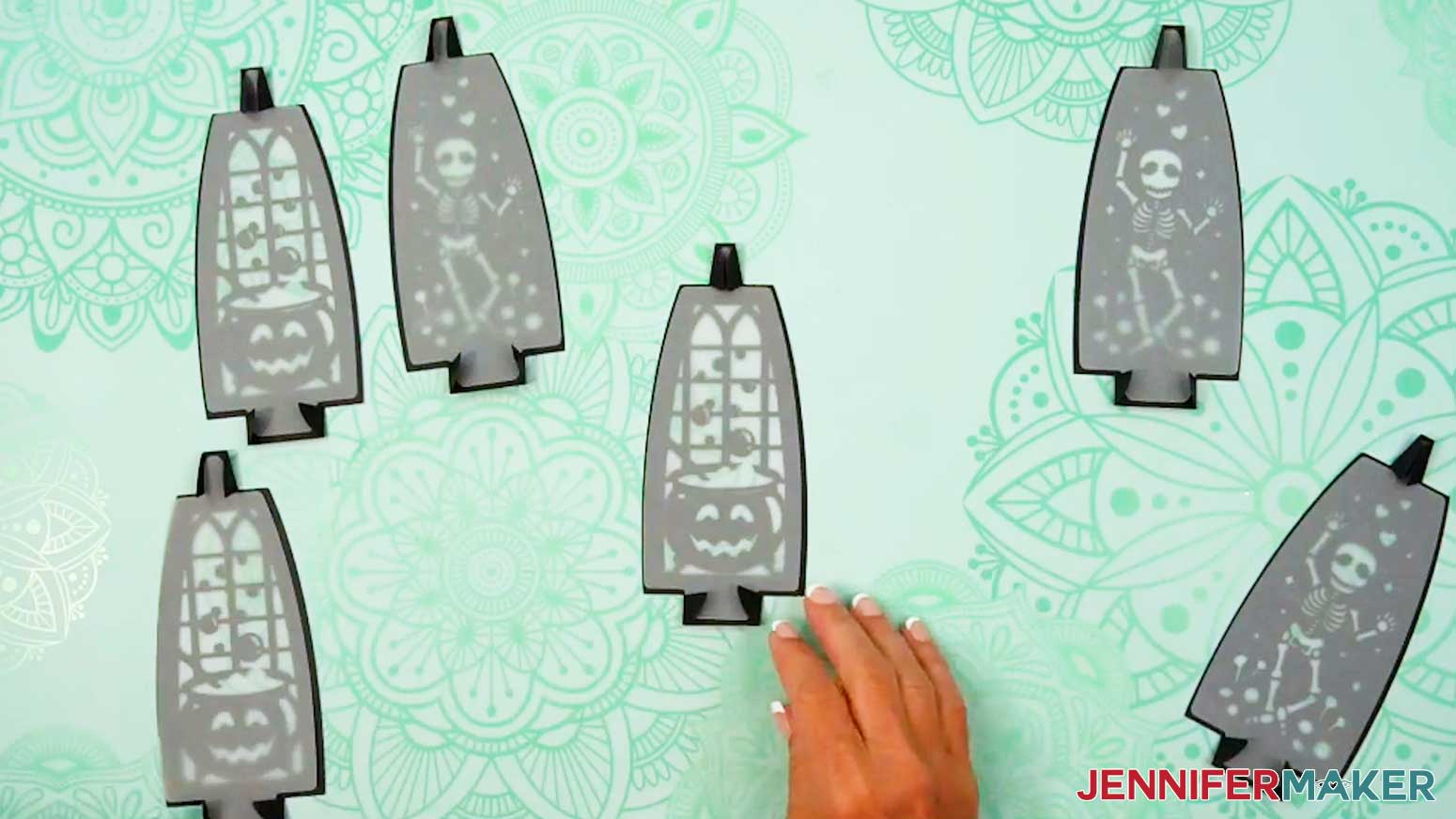 All six panels folded and paired with their diffuser pieces for the paper Witch Lantern.