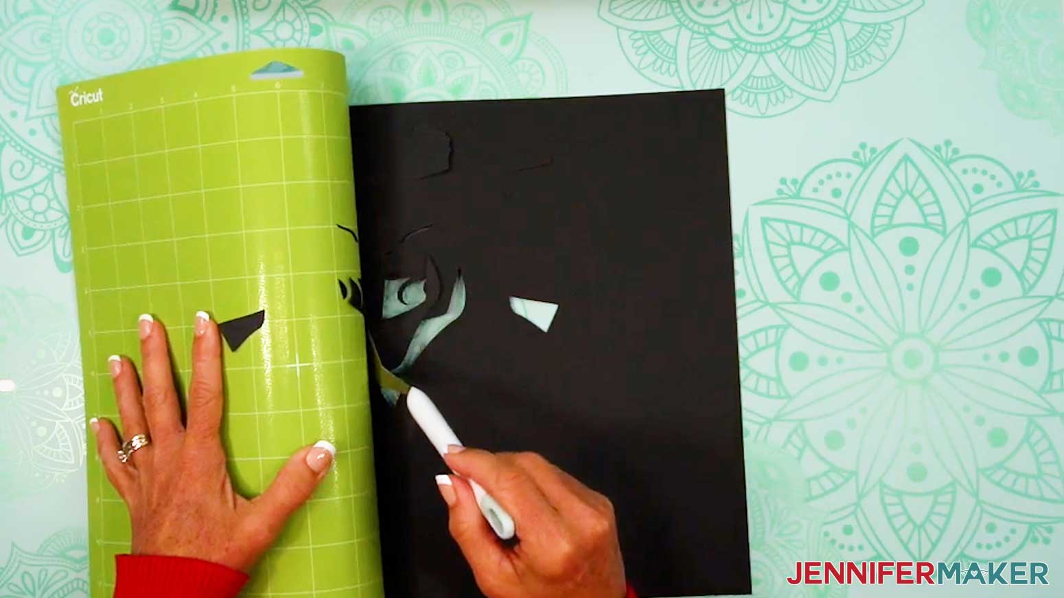 Use the spatula to help lift delicate parts of the Witch Lantern cut pieces from the mat.